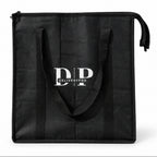Real front view of the black DeliveryPro Premium insulated food delivery tote bag with long carry handles, zipper closure, and DeliveryPro logo.